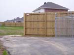 Board to Board cedar fence install, NW Arkansas