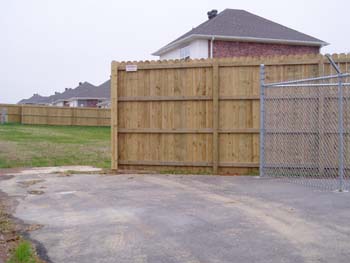 Board to Board cedar fence install — NW Arkansas, 8' treated pine